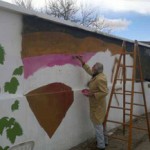 Miro Barraza pinta el 7º mural de Cafayate